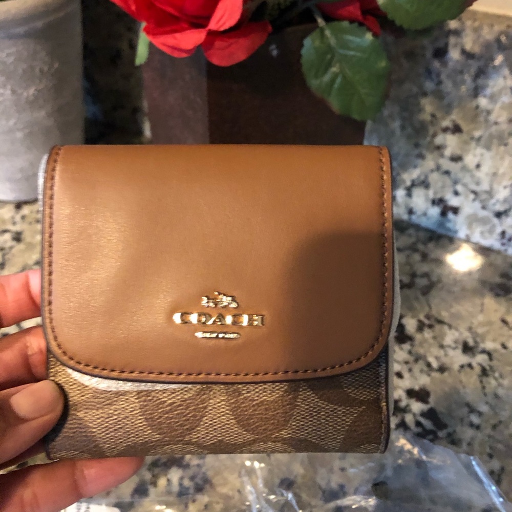Coach sm wllet sign. canvas & cross body pouch.